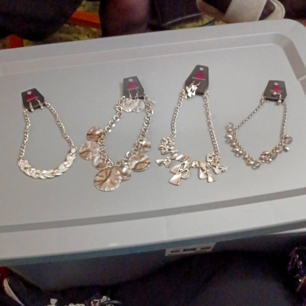 4 Paparazzi necklaces and 4 earrings